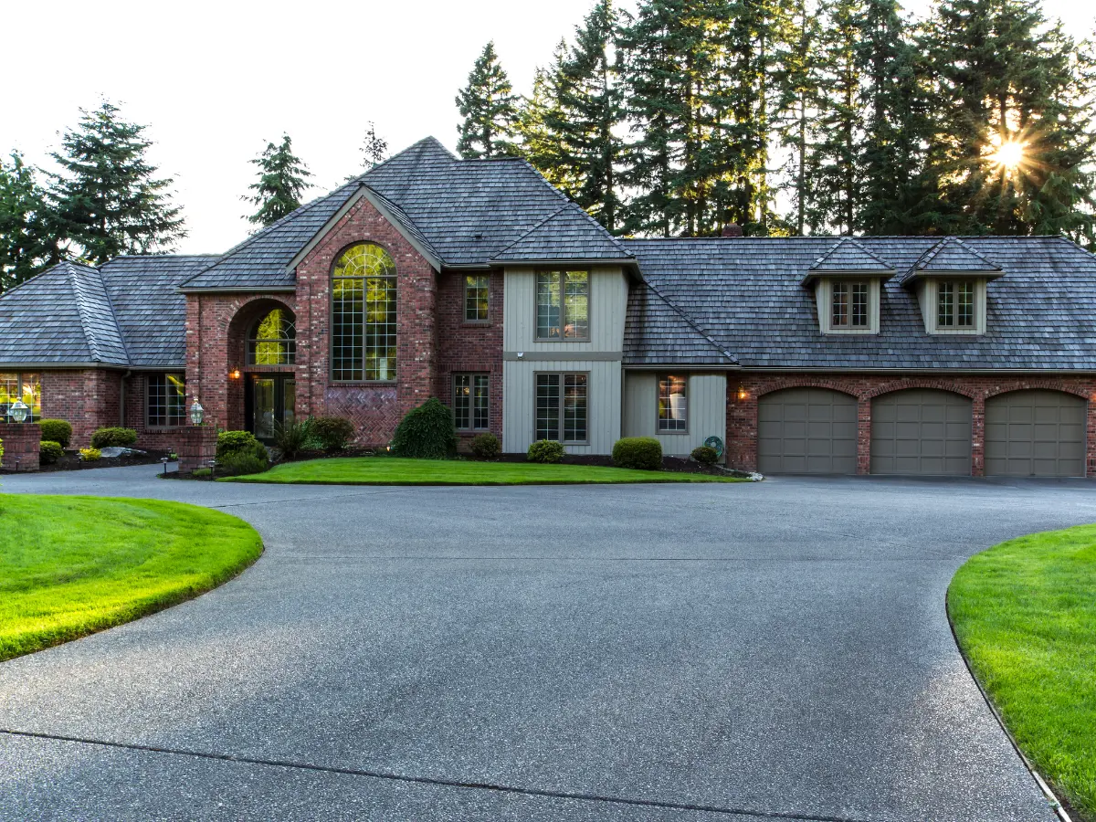 New architectural shingle roof on a Canton, GA home at golden hour
